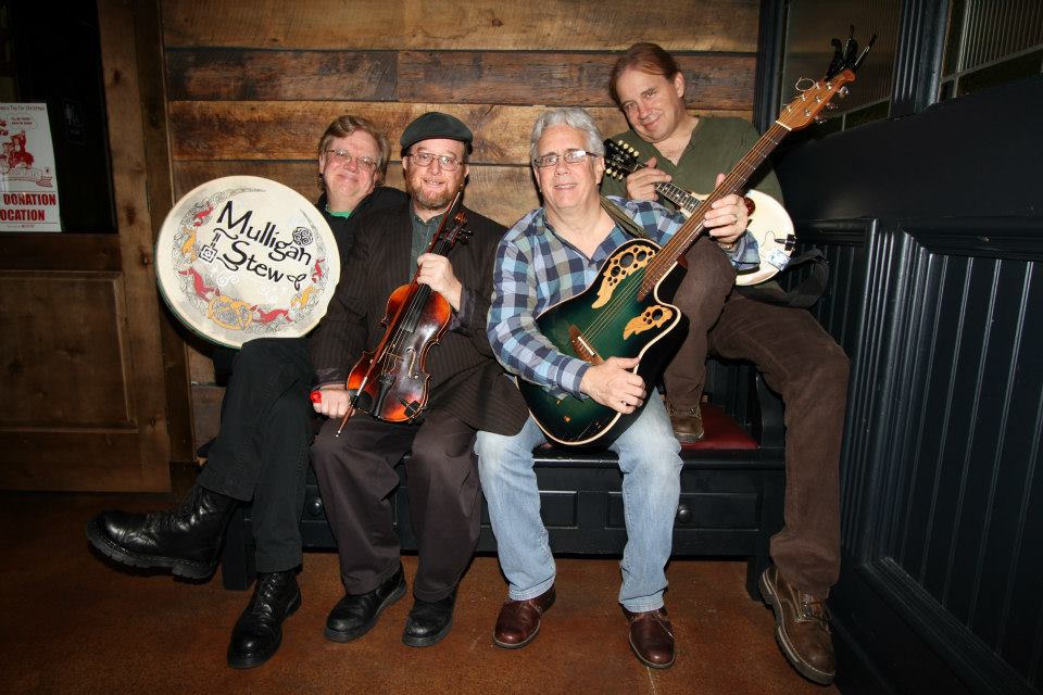 The band Mulligan Stew with their instruments